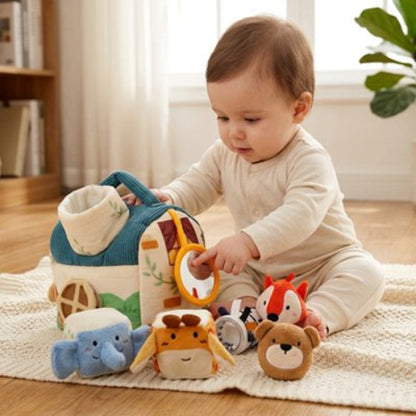 Cube d'activité bébé assit avec jouets