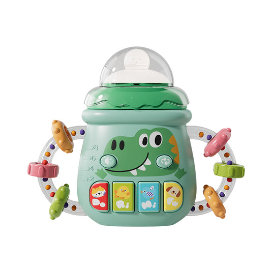 hochet bébé bouteille dinosaure vert