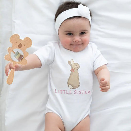 Hochet bébé sourit avec jouet