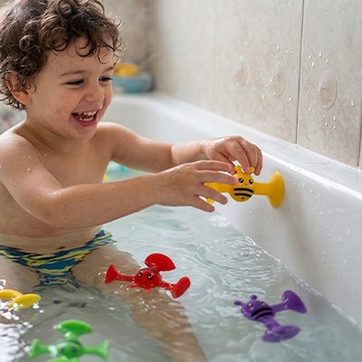 Jouet de bain jaune rouge bleu enfant eau