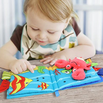 Livre bebe en tissus crabe rouge