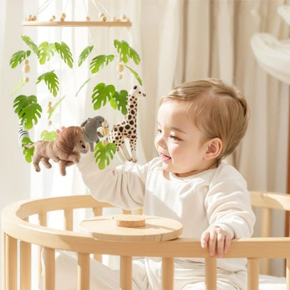 mobile-bebe-sourit-avec-girafle