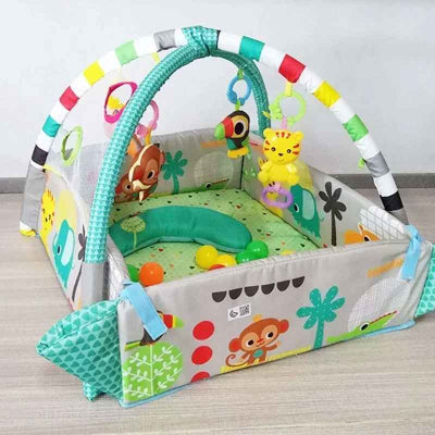 tapis d'éveil bébé vert avec jouet
