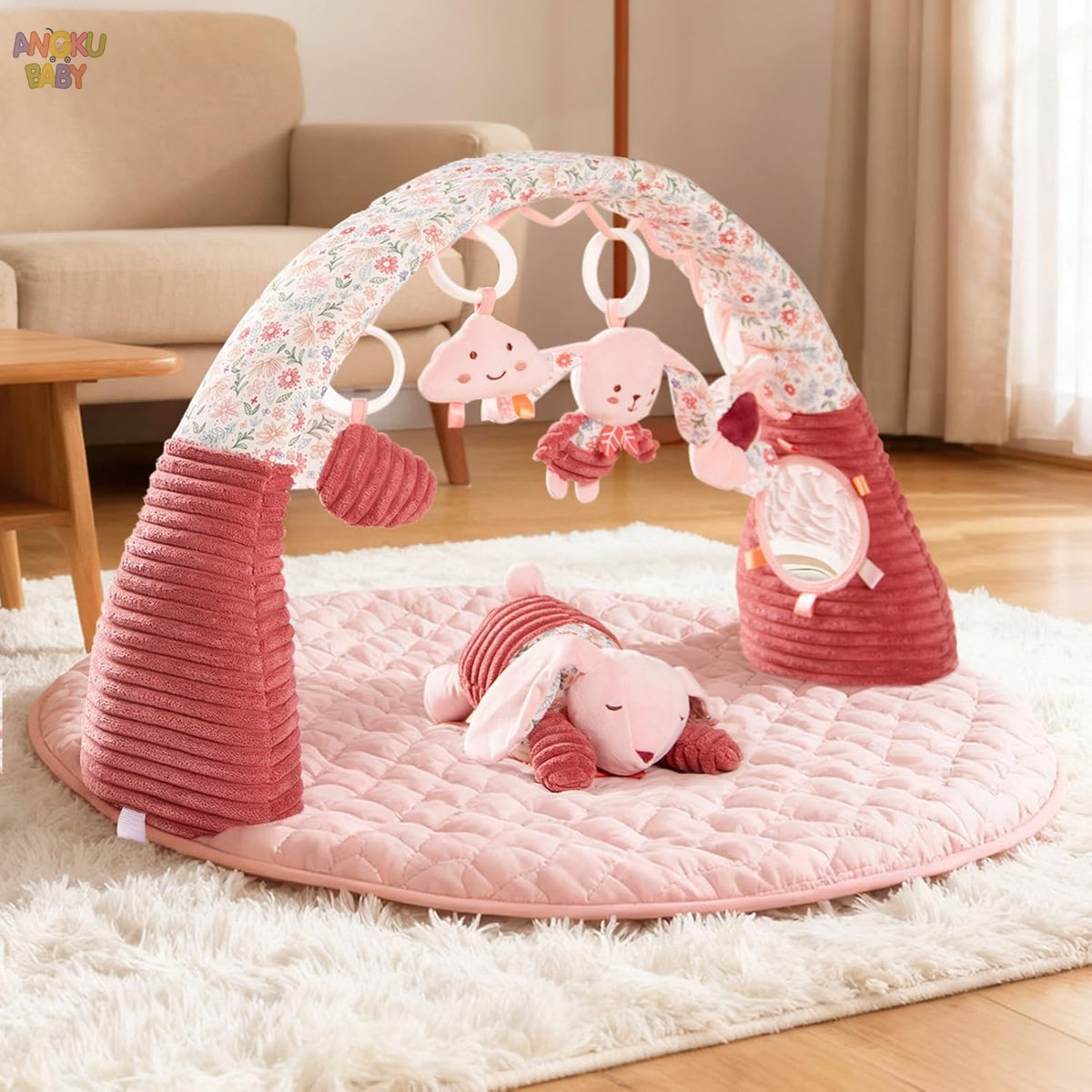 tapis d'éveil rose avec jouet