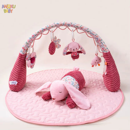 tapis d'éveil rose et jouet