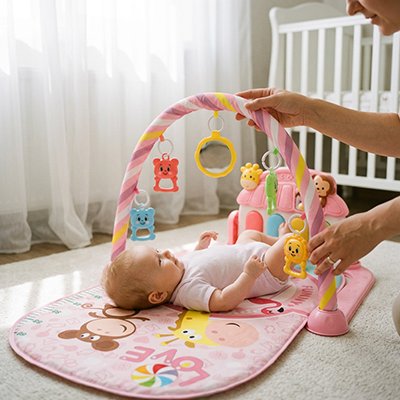 Tapis eveil bebe rose bébé detendu